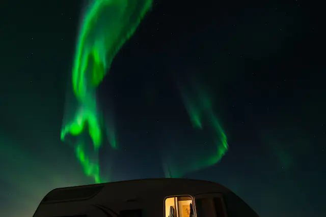 Aurora borealis in the night sky above Iceland