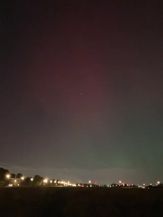 Aurora borealis in the night sky above Scotland