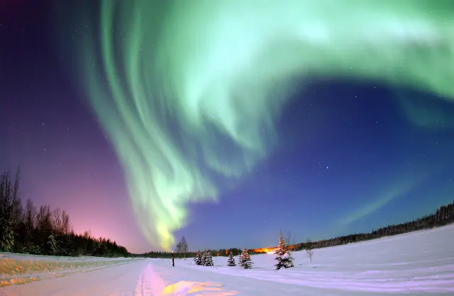 Aurora borealis in the night sky above United States