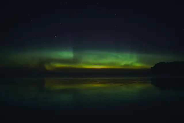 Aurora borealis in the night sky above Finland