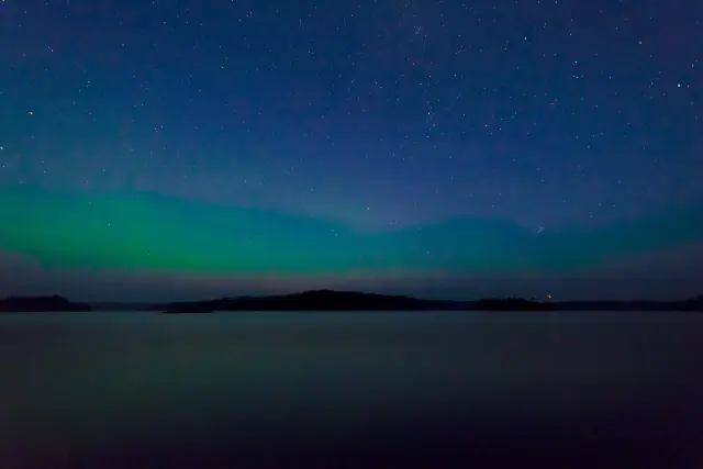 Aurora borealis in the night sky above Finland