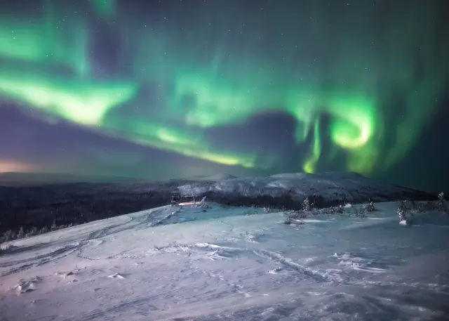 Aurora borealis in the night sky above Finland