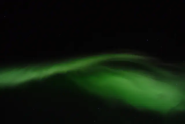 Aurora borealis in the night sky above Finland