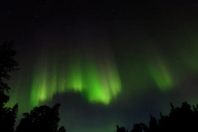 Aurora borealis in the night sky above Canada